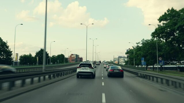 Dashboard camera point of view. View From the Car Windshield to the city road. Hyperlapse Road Trip Sort of Dashcam POV. Travel Concept. Warsaw