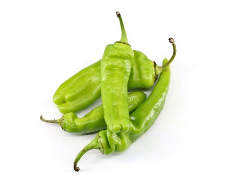 Friggitello, sweet italian chili peppers, on white background. They are also also know as Golden greek peppers