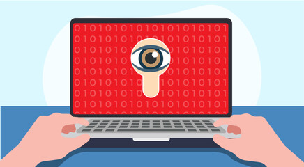 scene of a person working on a laptop with a spy eye on the screen. concept of maware, phishing, spyware, malware. 