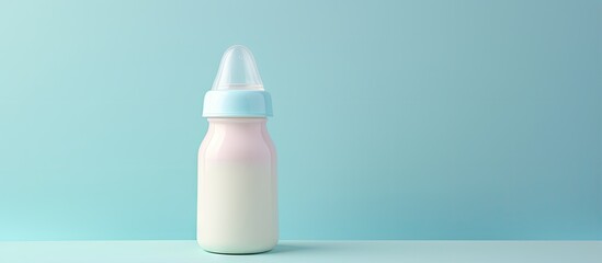 Infant formula on a isolated pastel background Copy space with a feeding bottle - obrazy, fototapety, plakaty