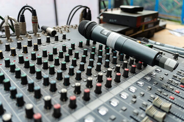 the concert microphone is on the mixing console. concept of sound recording.