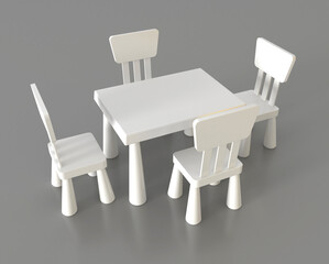 White plastic set for children to sit and play in the kindergarten or to place in the children's room. White children table with two plastic chairs isolated on white background. 