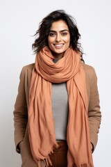 Fototapeta premium Indian winter fashionista inspiring cold-weather style and her inviting smile define chic