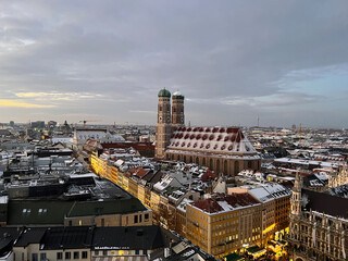 The Frauenkirche with it's famous 2 towers top this restored Gothic church, viewing from the top of St. Peter tower, Munich, Germany