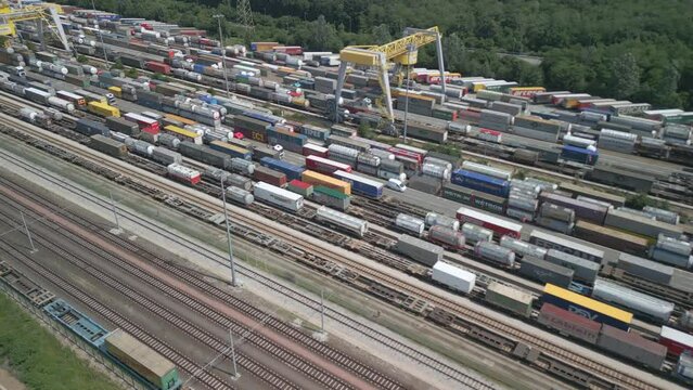 Aerial view of a road-rail transshipment terminal in Italy. The cargo begins its journey by train and is picked up by a truck to its final destination by road.