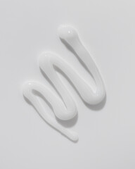 Beauty cream texture. White lotion, moisturizer, skin care cosmetic product smear background