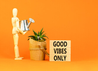 Good vibes only symbol. Concept word Good vibes only on beautiful wooden block. Businessman model....