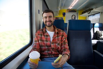 Traveler enjoying a confortable train 
