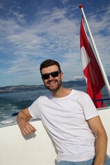 Male passenger of a motor boat 