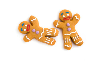 gingerbread cookies in the shape of men on a white background