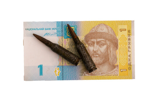 Ukrainian banknotes and bullets