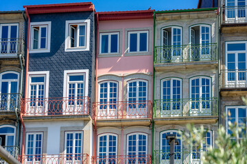 Beautiful colorful building facede in Porto Portugal with azulejo tiles - obrazy, fototapety, plakaty