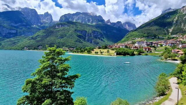 Most scenic mountain lakes in northern Italy - beautiful Molveno in Trento, Trentino Alto Adige region. 4k hd video