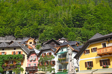 Houses with flowers on the terraces  in Hallstatt village Austria