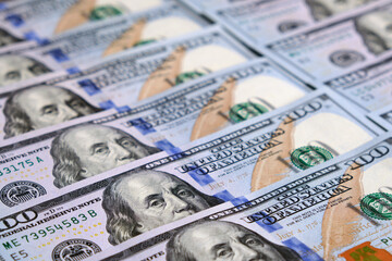 Lots of 100 American dollar bills.