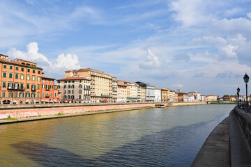 Fototapeta premium Pisa, Italy. September 16, 2023. The river Arno through the town of Psa, Italy