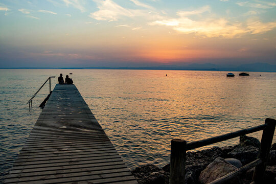 Lakeview at sunset from walkway at Cisano, Bardolino, Lake Garda, Italy