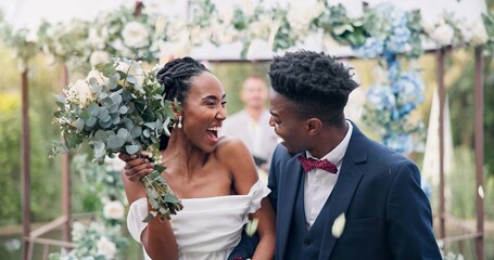 Couple, flower confetti and outdoor wedding with event, walk and happy laugh in nature. Black woman, man and excited for marriage, floral bouquet or holding hands in park, party or together in aisle - Powered by Adobe