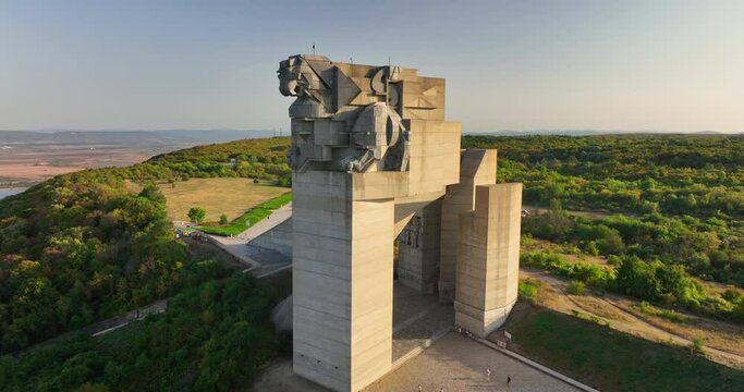 Aerial view of colossal monument 1300 years Founders of the Bulgarian State in Shumen, Bulgaria and aerial panorama view of city and mountain landscape