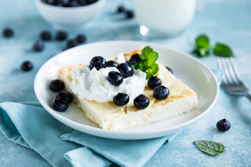 Cottage cheese cheesecake slice with fresh blueberry