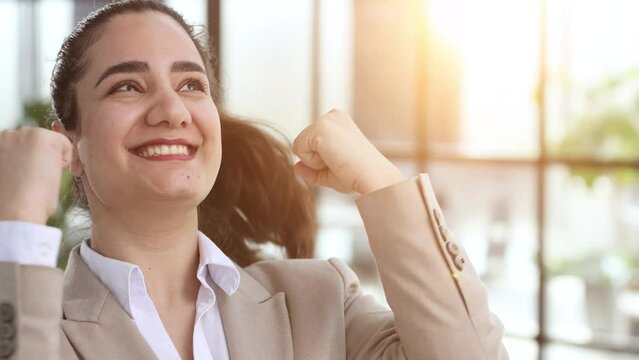 Photo of young overjoyed office assistant girl raise fists up