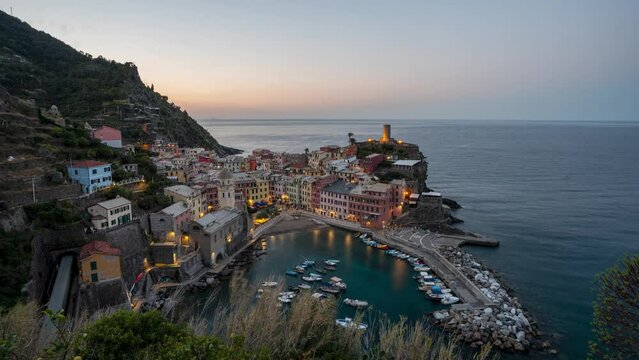 Time lapse of incredible view during blue hour and sunrise on Vernazza, Cinque Terre, Italy