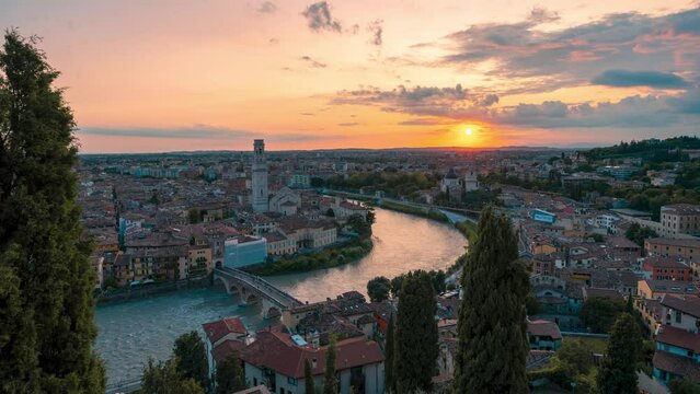 Time lapse of beautiful sunset in the city of Verona, Italy, with view over the Adige river