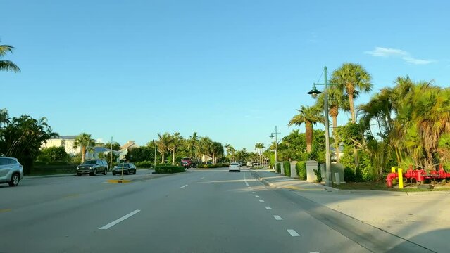Point of view POV car vehicle driving in Florida. road with cars in traffic 