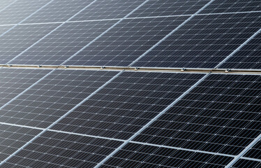 Close-up of dark blue solar panel, abstract solar panels texture background.