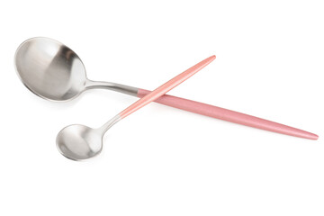 Stainless steel spoons with pink handles on white background