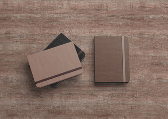 3D illustration. Notebook moleskine isolated on the wooden background