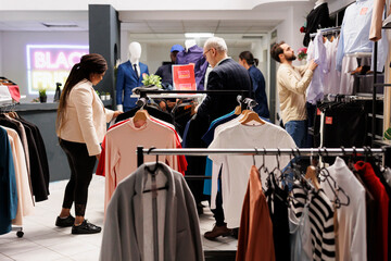 Shopaholism and Black Friday. Shopaholic diverse people consumers looking for new fashionable...