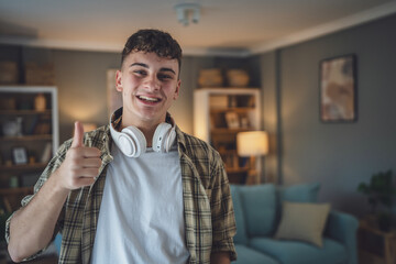Portrait of teenage boy caucasian teen male young man stand at home