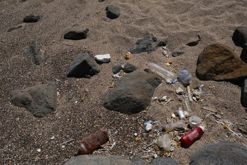 Pollution left by people on the beach