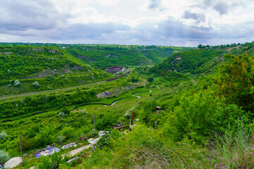 Picturesque green hilly valley. Background with selective focus and copy space