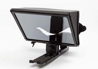 Showcasing a modern, reliable teleprompter, ideal for smooth on-air reading for presenters and journalists. High-quality design for professional use.