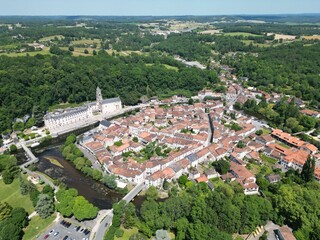 Brantome France in Dordogne medieval town establishing aerial shot.