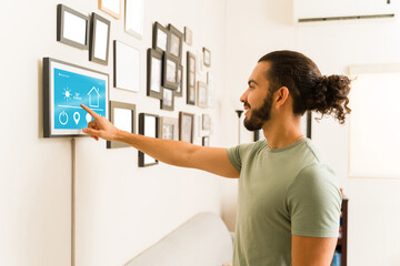 Mexican man with a smart home and technology concept