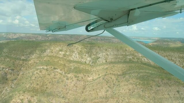 Low aerial view of the bays around Buccaneer Bay heading towards Cygnet Bay
