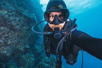 selfie of a scubadiver in a coral reef