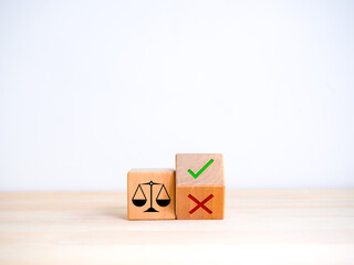 Decision, right or wrong, moral issue, ethical dilemma concepts. Scales of justice, icon on wood...