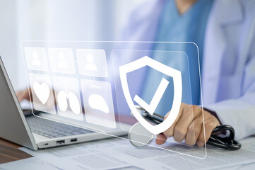 Doctor healthcare insurance concept. Doctor use computer screen medical insurance icon on global...