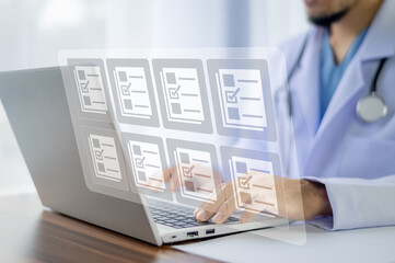Doctor using computer Document Management System (DMS), online documentation database process...