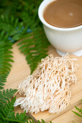 Mushroom coffee superfood. mushroom coffee with Lion’s mane mushrooms. A cup of coffee and...