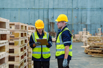 Team of Industrial factory engineer staff worker operate machine at production line. Production...