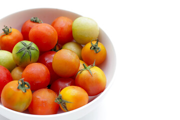 Fresh tomato on white background.