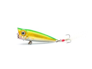 Picture of colorful fish shaped plug baits with 3 way hooks. Fishing equipment isolated on white...