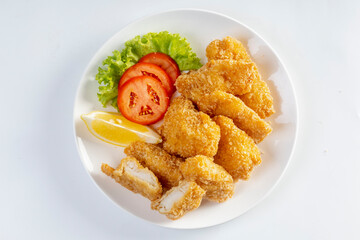 Battered and fried fish isolated on white background