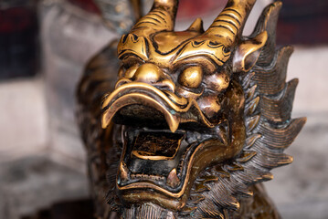 Bronze dragon statue in Daci buddhist temple, Chengdu, Sichuan province, China - 652594439