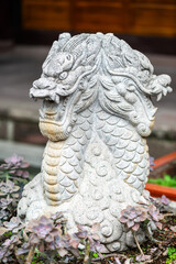Three dragon heads fountain in Daci buddhist temple, Chengdu, Sichuan province, China - 652594636